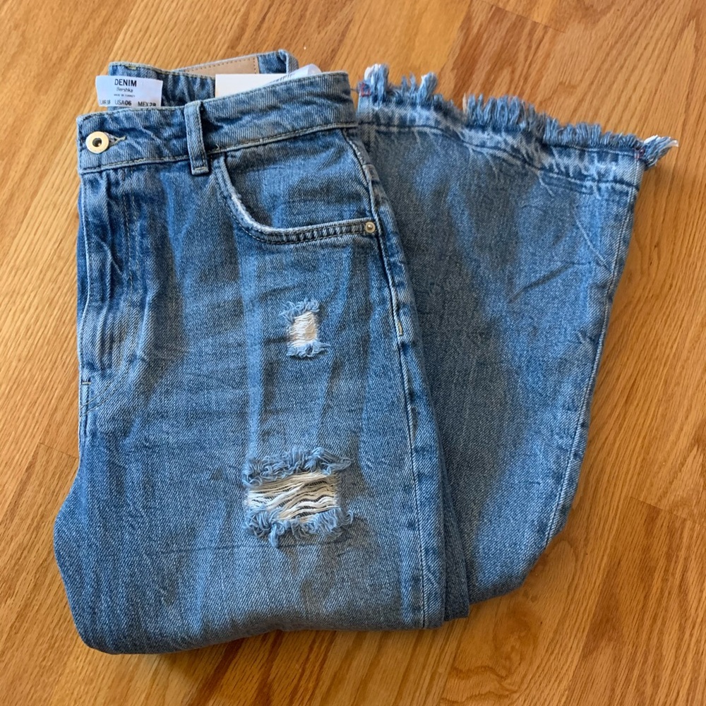 Never-worn High waisted flat leg ripped jeans